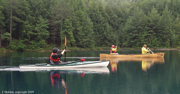 Canoes in the blue water, Killarney